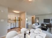 Thumbnail 5 of 12 - Living Room With Kitchen View at Walker Mill Apartments, District Heights, 20747